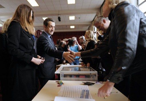 Nicolas Sarkozy et sa femme votaient à Paris. (Afp)