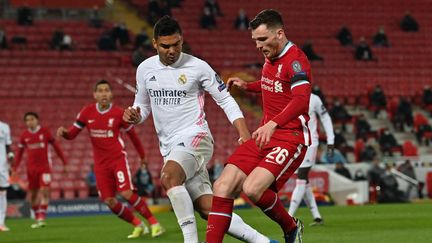 Le Real Madrid et Liverpool durant le quart de finale retour de la Ligue des champions, le 14 avril 2021&nbsp;au stade&nbsp;d'Anfield à Liverpool (Royaume-Uni). (PAUL ELLIS / AFP)