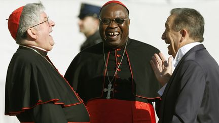 De bonne humeur en ce jour de r&eacute;signation, les cardinaux devront &eacute;lire le successeur de Beno&icirc;t XVI en conclave le mois prochain. (ALESSANDRO BIANCHI / REUTERS)