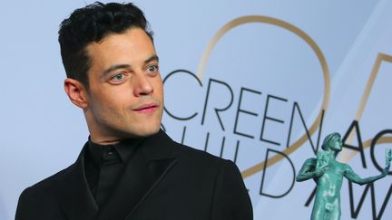 Rami Malek reçoit un Screen Actors Guild Awards en janvier 2019
 (Jean-Baptiste LACROIX / AFP)