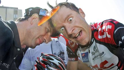 Le cycliste allemand&nbsp;Jens Voigt c&eacute;l&egrave;bre sa victoire lors de la 13e &eacute;tape du Tour de France, le 15 juillet 2006, &agrave; Mont&eacute;limar (Dr&ocirc;me). (FRANCK FIFE / AFP)