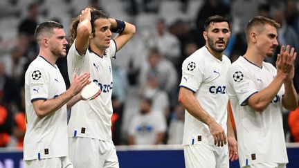 Les joueurs de l'Olympique de Marseille déçus de l'élimination contre Tottenham en Ligue des champions au stade Vélodrome, le 1er novembre (CHRISTOPHE SIMON / AFP)