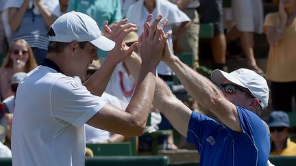 John Isner et Jim Courier (Etats-Unis)