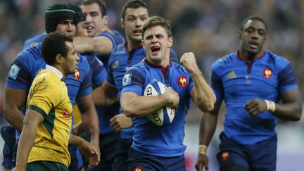 R&eacute;duits &agrave; 14 contre 15 en fin de match, les Bleus ont tenu bon face au Asutraliens. (GONZALO FUENTES / REUTERS)