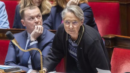 Elisabeth Borne et le ministre du Travail Olivier Dussopt à l'Assemblée nationale, le 14 mars 2023 (VINCENT ISORE / MAXPPP)