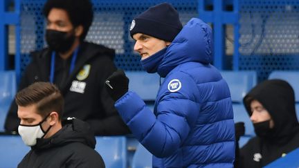 Thomas Tuchel serre le poing après le deuxième but de son équipe inscrit par Marco Alonso. (JUSTIN TALLIS / POOL)