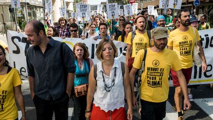 Les décrocheurs Pierre Goinvic (chemise noire) et Fanny Delahalle (chemisier blanc), le 2 septembre 2019 à Lyon (Rhône). (NICOLAS LIPONNE / NURPHOTO / AFP)