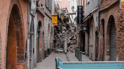 Un immeuble s'était effondré dans la nuit du 8 au 9 mars à Toulouse, rue Saint-Rome. (PAT BATARD / HANS LUCAS via AFP)