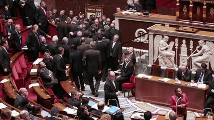 La ministre de la Justice, Christiane Taubira, &agrave; l'Assembl&eacute;e nationale &agrave; Paris, lors de l'examen du projet de loi sur le mariage pour tous, le 12 f&eacute;vrier 2013.&nbsp; (JACQUES DEMARTHON / AFP)