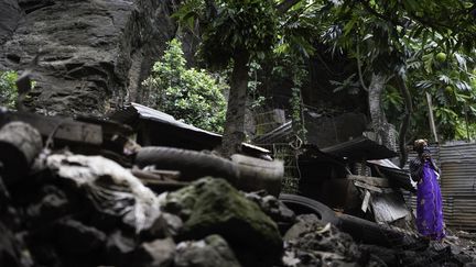 Un habitant d'un bidonville près de Koungou, à Mayotte dans l'océan Indien, le 19 février 2023. (MARION JOLY / AFP)