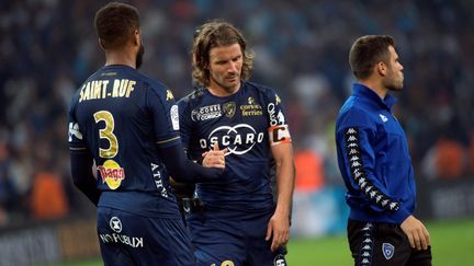 La déception des joueurs du SC Bastia, le soir de la relégation en L2 du club corse (BERTRAND LANGLOIS / AFP)