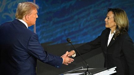 Republican presidential candidate Donald Trump shakes hands with Democratic opponent Kamala Harris at the start of their first televised debate in Philadelphia, Pennsylvania, U.S., on September 10, 2024. (SAUL LOEB / AFP)