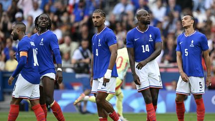 Players of the French team after a goal by Spain in the final of the Olympic football tournament, on August 9, 2024, at the Parc des Princes. (JONATHAN NACKSTRAND / AFP)