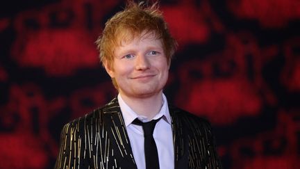 Le chanteur anglais Ed Sheeran à la cérémonie des NRJ Music Awards, sur le tapis rouge du Palais des Festivals à Cannes, France, 6 avril 2022 (VALERY HACHE / AFP)