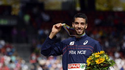 L'athlète français Mahiedine Mekhissi lors de sa victoire sur le 1500 m, aux championnats d'Europe d'athlétisme, le 17 août 2014, à Zurich (Suisse). (FRANCK FIFE / AFP)