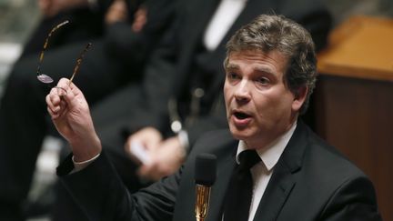 Le ministre du Redressement productif,&nbsp;Arnaud Montebourg, le 7 janvier 2014 &agrave; l'Assembl&eacute;e nationale. (PATRICK KOVARIK / AFP)