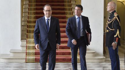 Fran&ccedil;ois Hollande et Manuel Valls le 27 ao&ucirc;t 2014 &agrave; l'Elysee (FRED DUFOUR / AFP )