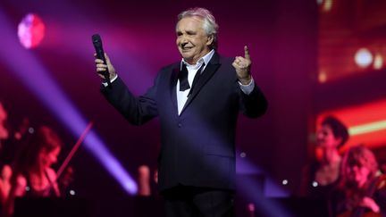 Michel Sardou, lors de son dernier concert à La Seine Musicale, en 2018. (JEAN-BAPTISTE QUENTIN / MAXPPP)