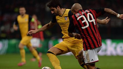 Diego Costa (à gauche) buteur face au Milan AC (FILIPPO MONTEFORTE / AFP)