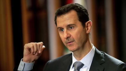 Le président Bachar Al-Assad, le 20 janvier 2014. (JOSEPH EID / AFP)