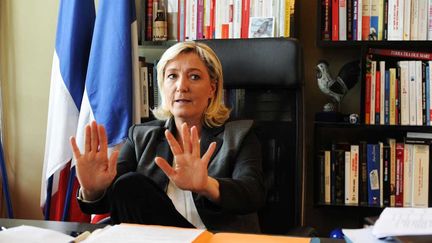 &nbsp; (Marine Le Pen dans son bureau au siège du Front National à Nanterre, en 2014 © Eric Baudet/JDD/SIPA)