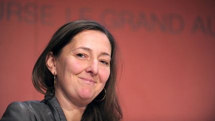 Karine Berger, d&eacute;put&eacute;e PS des Hautes-Alpes, lors d'une conf&eacute;rence de l'Autorit&eacute; des march&eacute;s financiers, &agrave; Paris, le 28 novembre 2013.&nbsp; (ERIC PIERMONT / AFP)