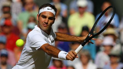 Roger Federer tentera de remporter un 9e titre à Wimbledon. (GARETH FULLER / AFP)