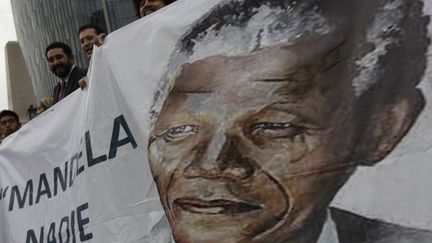 Manifestation en l'honneur de Nelson Mandela, &agrave; Mexico (Mexique), le 18 juillet 2013. (© HENRY ROMERO / REUTERS / X00897)