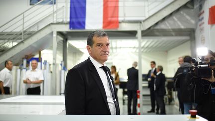 Michel Catalano dans son imprimerie de&nbsp;Dammartin-en-Goële (Seine-et-Marne), le 29 septembre 2016. (STEPHANE DE SAKUTIN / AFP)