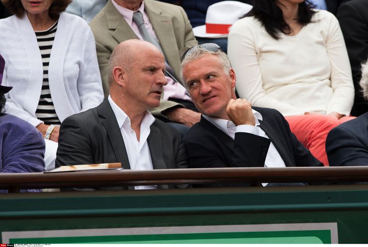 Guy Stéphan et Didier Deschamps, complices même dans les tribunes de Roland-Garros, le 1er juin 2013. (PDN/SIPA)