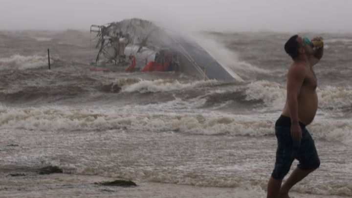 A boat overturned near the coast of Saint Petersburg, Florida, as Storm Helene, measured as Category 3, arrived in the state on September 26, 2024. (JOE RAEDLE / GETTY IMAGES NORTH AMERICA)