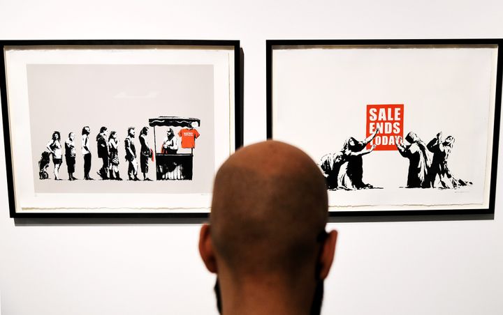 "Festival" et "Sale Ends" de Banksy 
 (VINCENZO PINTO / AFP)