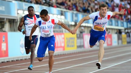 Le Britannique Harry Aikines-Aryeetey et les Fran&ccedil;ais Jimmy Vicaut et Christophe Lemaitre en finale du 100m des championnats d'Europe d'athl&eacute;tisme le 28 juin 2012. (OLIVIER MORIN / AFP)