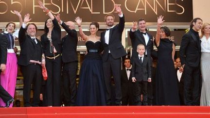 L&#039;équipe du film en haut des marches
 (AFP PHOTO / ALBERTO PIZZOLI)