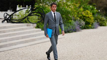 Resigning Prime Minister Gabriel Attal at the Elysée Palace in Paris on August 23, 2024. (DIMITAR DILKOFF / AFP)