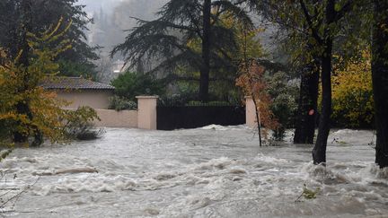 Les eaux du fleuve côtier Le Loup sont montées lors de l'épisode méditerranéen, inondant Pont-du-Loup (Alpes-Maritimes), le 23 novembre 2019.&nbsp; (YANN COATSALIOU / AFP)