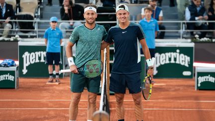 Le Norvégien Casper Ruud et le Danois Holger Rune, lors de leur quart de finale à Roland-Garros en 2022. (MINE KASAPOGLU / AFP)