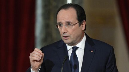 Conf&eacute;cence de presse du pr&eacute;sident Fran&ccedil;ois Hollande &agrave; l'Elys&eacute;e le 14 janvier 2014 (ALAIN JOCARD / AFP)