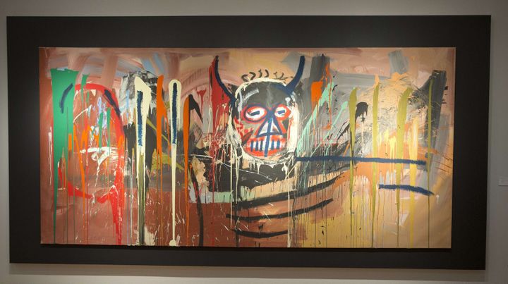 La gigantesque toile, sans titre, adjugée chez Christie's à 57,2 millions d'euros, en mai 2016. Record de vente pour Jean-Michel Basquiat.
 (Mary ALTAFFER / AP / SIPA)