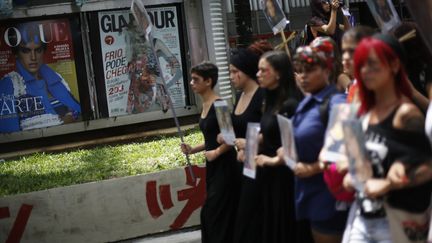 Des femmes manifestent &agrave; Sao Paulo, au Br&eacute;sil, samedi 8 mars 2014, &agrave; l'occasion de&nbsp;la Journ&eacute;e internationale des droits des femmes.&nbsp; (NACHO DOCE / REUTERS)