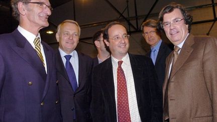 Joël Batteux (à gauche) avec François Hollande (© AFP/FRANCK PERRY)