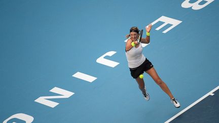 Azarenka passe en force (GOH CHAI HIN / AFP)