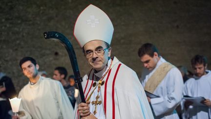 Le cardinal Philippe Barbarin mène une procession à Lyon, le 8 décembre 2015. (FRANCK CHAPOLARD / CITIZENSIDE / AFP)