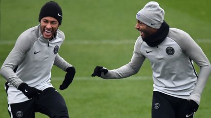 Neymar et Lucas ensemble à l'entraînement du PSG (FRANCK FIFE / AFP)