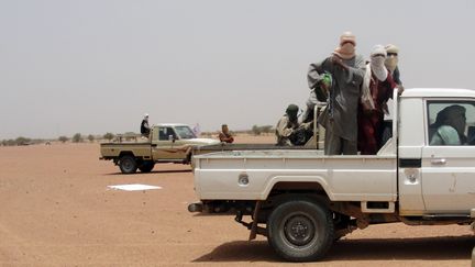 Des combattants d'Ansar Dine, dans la région de Kidal (nord du Mali), le 7 août 2012. (ROMARIC HIEN / AFP)