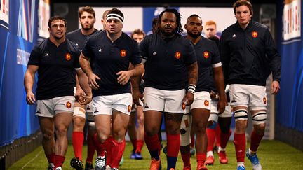 L'équipe de France menée par son capitaine Guilhem Guirado (FRANCK FIFE / AFP)