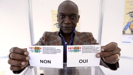 Le collectif Votation citoyenne, qui milite pour le droit de vote des &eacute;trangers,&nbsp;a organis&eacute; son propre r&eacute;f&eacute;rendum, &agrave; Paris, le 23 mars 2008. (STEPHANE DE SAKUTIN / AFP)