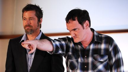 Brad Pitt&nbsp;et&nbsp;Quentin Tarantino lors de la&nbsp;présentation du film "Inglourious Basterds", le 18 septembre 2009, au festival de San Sebastian en Espagne. (RAFA RIVAS / AFP)