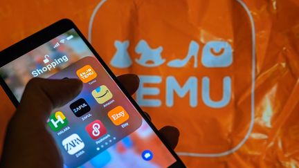 The Temu app icon is displayed on a smartphone with a Temu package visible in the background, in Brussels, Belgium, April 1, 2024. (JONATHAN RAA / NURPHOTO)