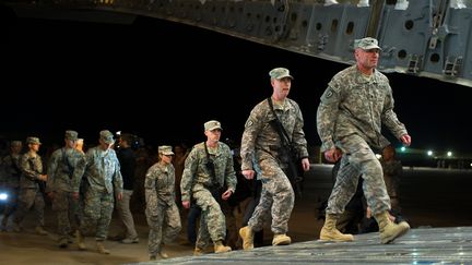 Des soldats américains quittent la camp Adder en Irak, le 17 décembre 2011. (MARTIN BUREAU / AFP)